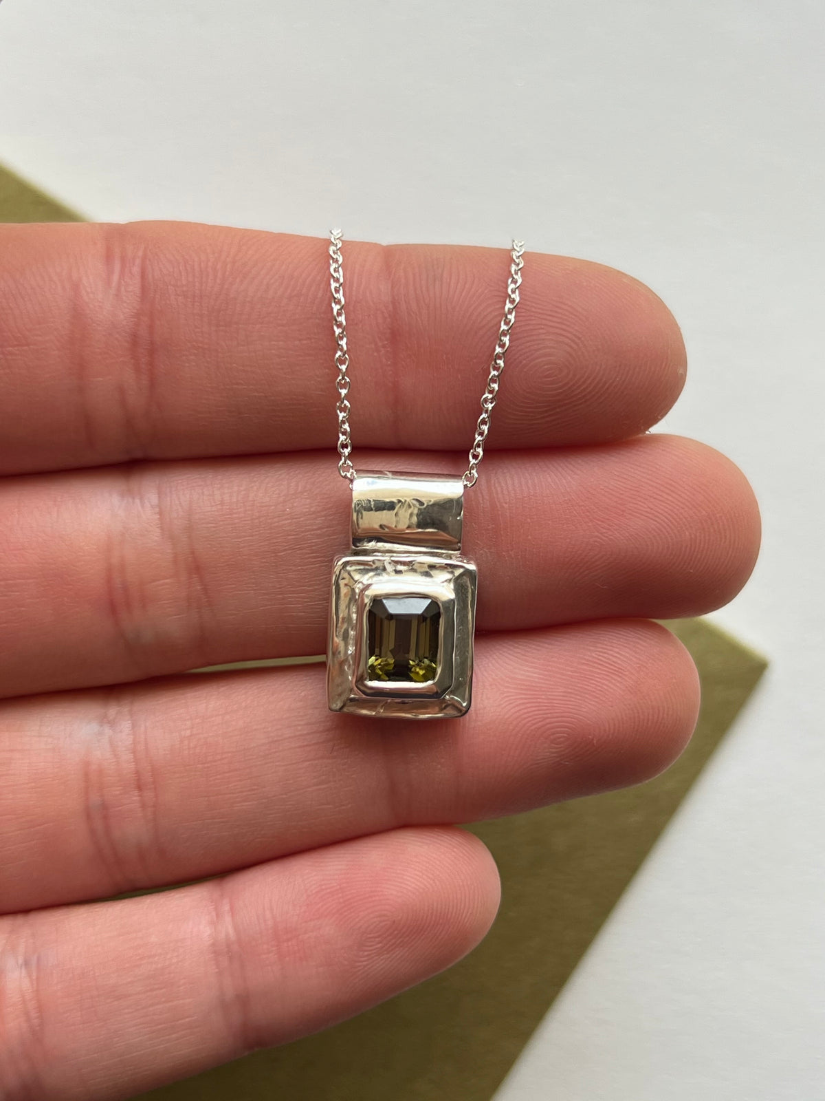 NAIA pendant